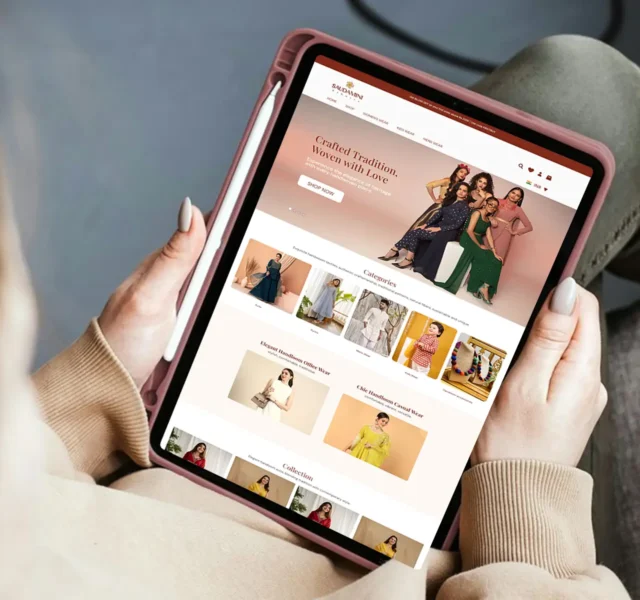 A woman browsing the Saubhari eCommerce fashion website on a tablet, showcasing elegant ethnic wear and modern collections — a Thinkster-designed online store emphasizing UX, responsiveness, and visual storytelling.