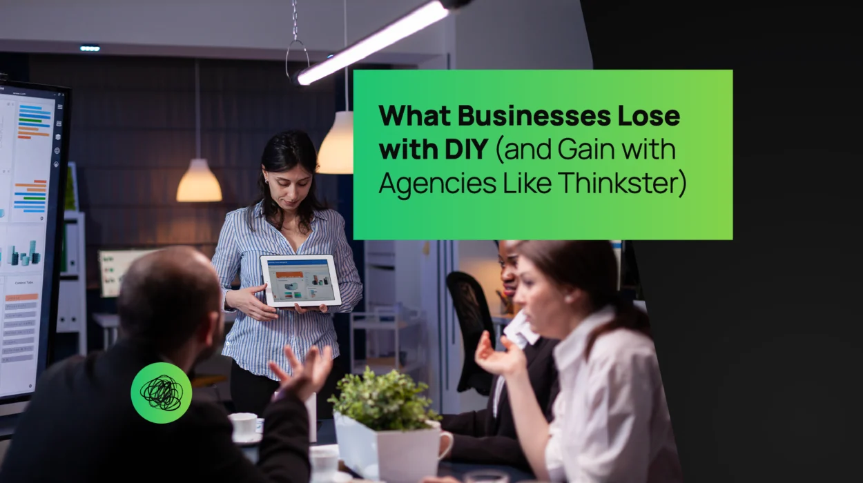 Creative professionals collaborating in a modern office, with a woman presenting a digital project on a tablet — overlaid with the text “What Businesses Lose with DIY (and Gain with Agencies Like Thinkster),” symbolizing the value of expert-led digital strategy over do-it-yourself design.