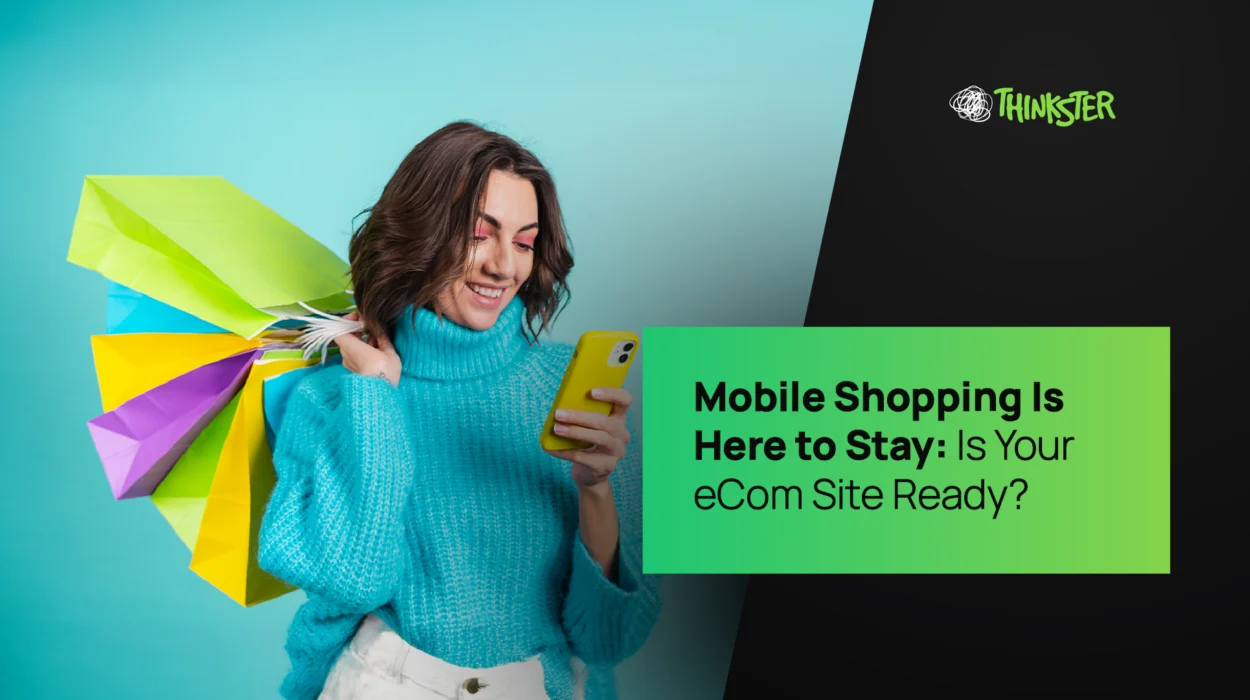 A cheerful woman holding colorful shopping bags looks at her smartphone with excitement, representing the rise of mobile commerce. The overlay text reads “Mobile Shopping Is Here to Stay: Is Your eCom Site Ready?”, symbolizing Thinkster’s expertise in mobile-first eCommerce web design and optimization.